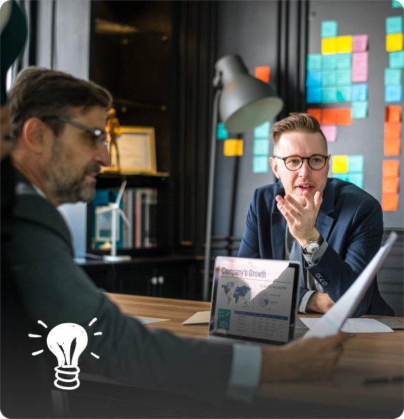 Business professionals discussing eCommerce strategy and planning during a Shopify Plus consultation