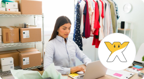 Woman working at a desk with packages and clothes on racks behind her; Wix logo is visible in the foreground.
